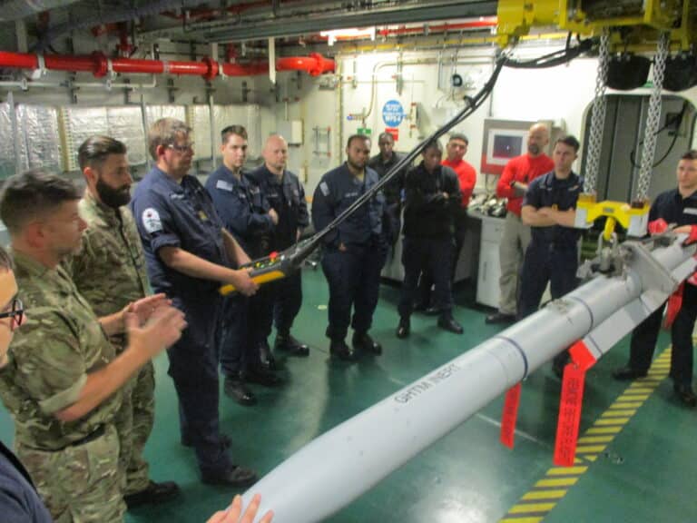 U.K. weapons personnel from the Patuxent River F-35...
