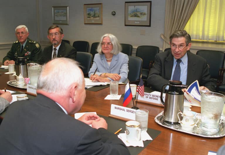 Deputy Secretary of Defense Paul Wolfowitz (right) meets...