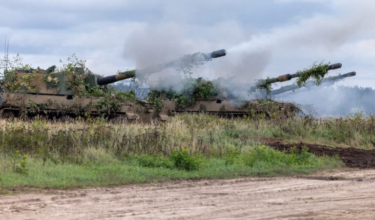 Polish Land Forces AHS Krab howitzers fire rounds during...
