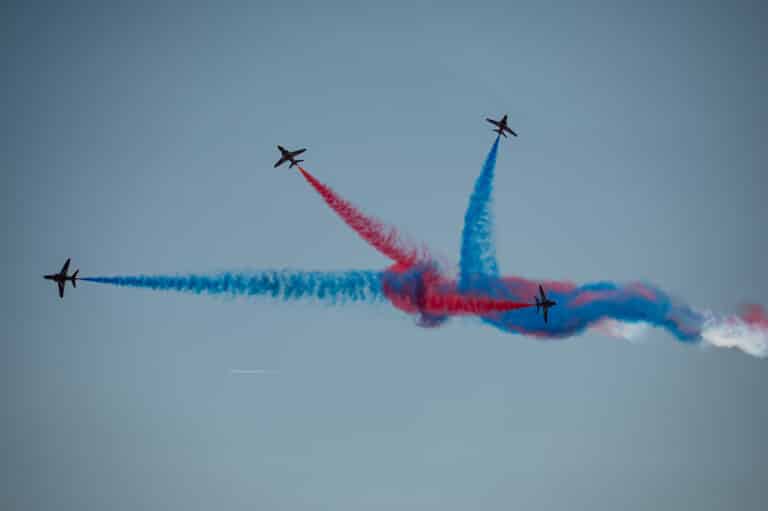 The RAF Red Arrows perform a maneuver with their Hawk T1...