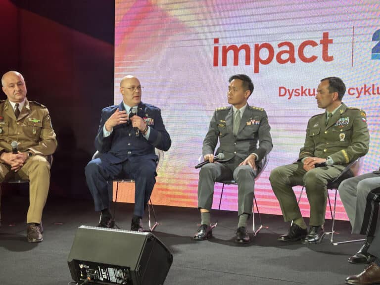 U.S. Air Force Brig. Gen. Jason Christman (second from...
