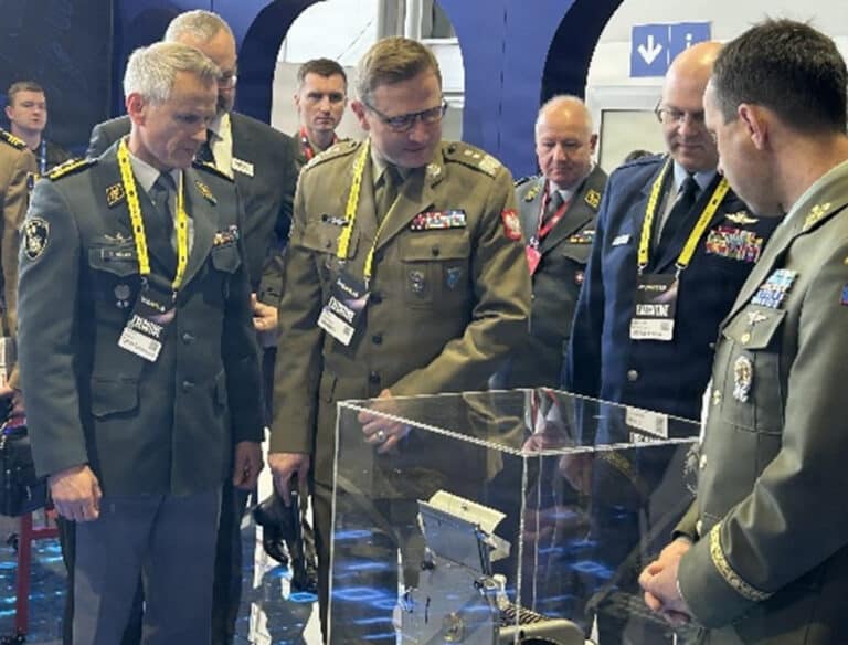 (From left) Swiss Armed Forces Maj. Gen. Simon Müller,...