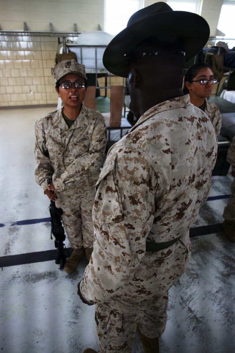 A U.S. Marine Corps drill instructor with India Company,...