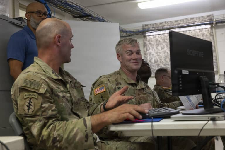 Maj. Jason Landis and John Metcalf, competitors...