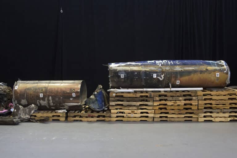 A display shows recovered Iranian Qiam class ballistic...