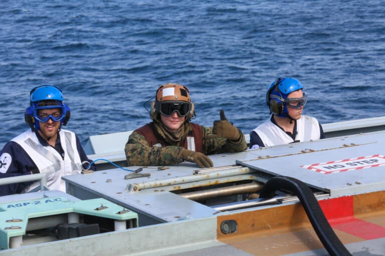 Marines and Royal Navy Sailors with Marine Fighter...
