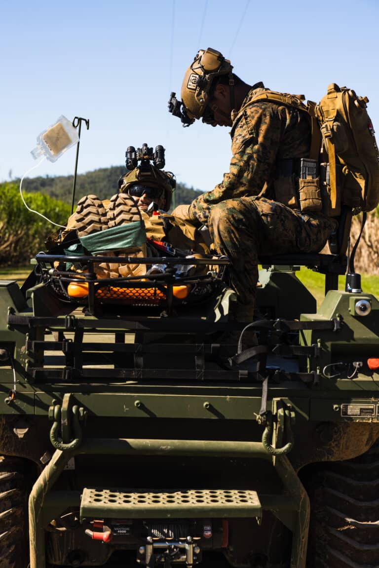 U.S. Navy Petty Officer 3rd Class Todd Kajornkitipoom, a...