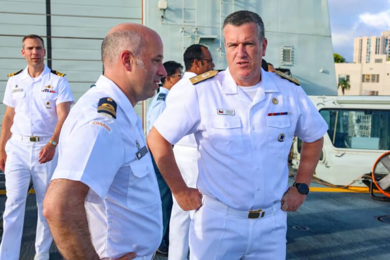 Royal Canadian Navy Cmdr. Justin Simmons, commanding...