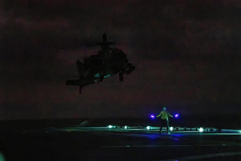A U.S. Army AH-64 Apache helicopter assigned to 25th...