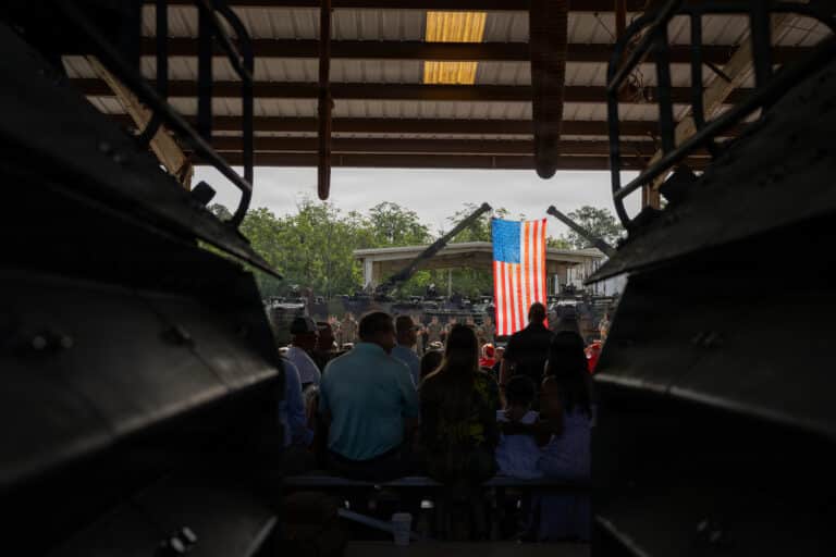 U.S. Marines, friends, family and guests attend a...