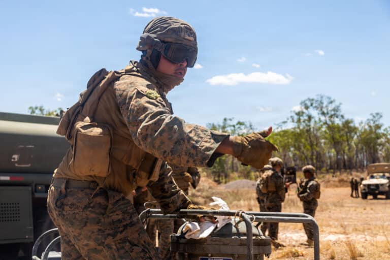 U.S. Marines Corps Lance Cpl. Jason Twobulls, a bulk...