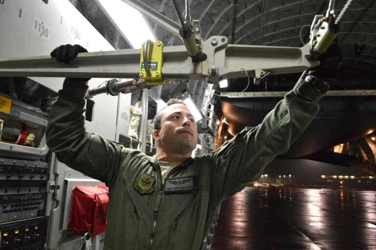 U.S. Air Force Staff Sgt. Jonathan Akers, a C-17...