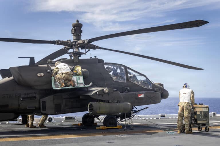 U.S. Army AH-64 Attack Helicopter Repairers assigned to...